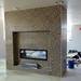 Construction continues around a double sided fireplace in a multi-purpose room at Landmark. Melanie Maxwell I AnnArbor.com